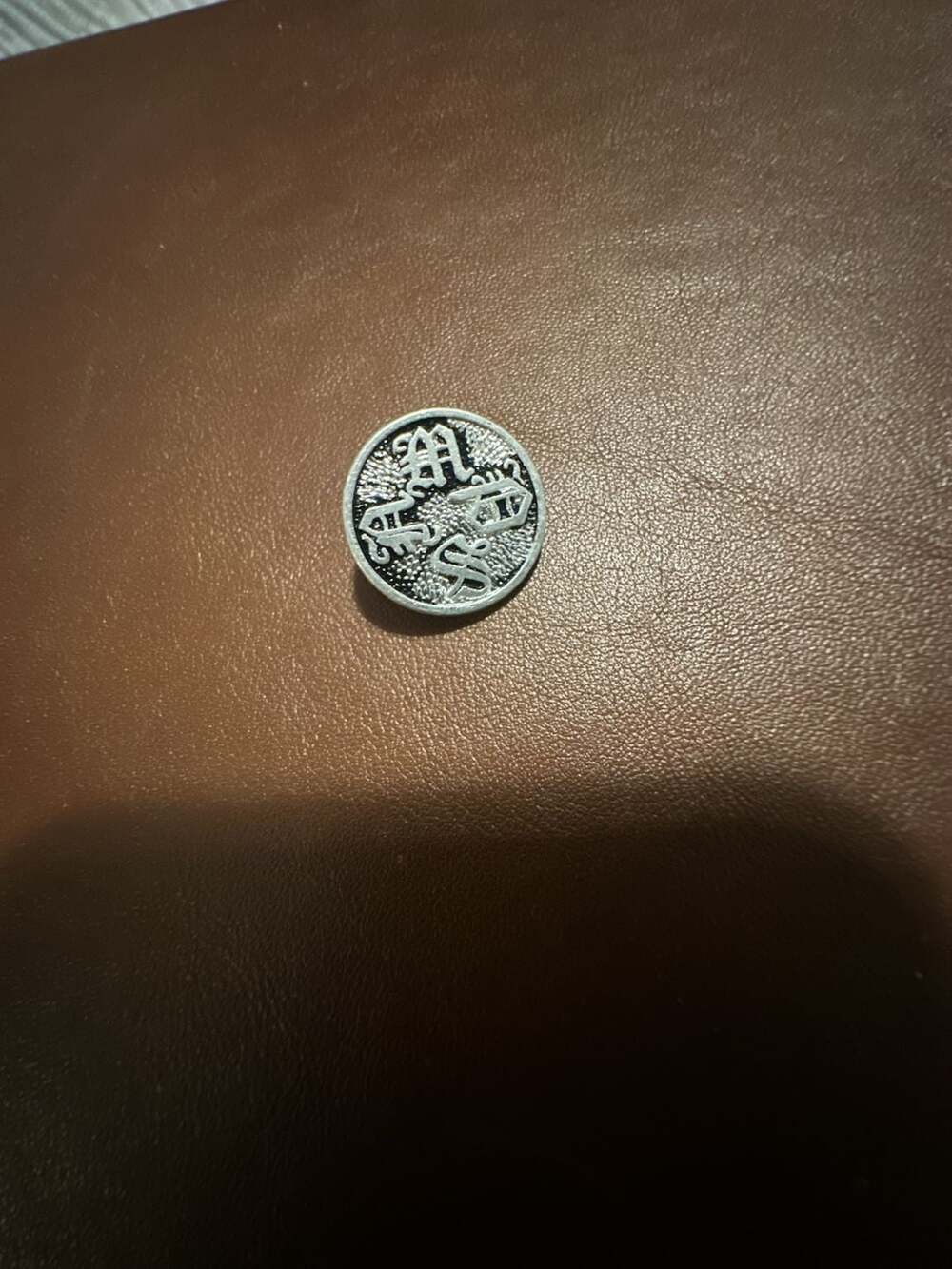 Vintage Metal Shank Button with Asian-Inspired Symbol Design